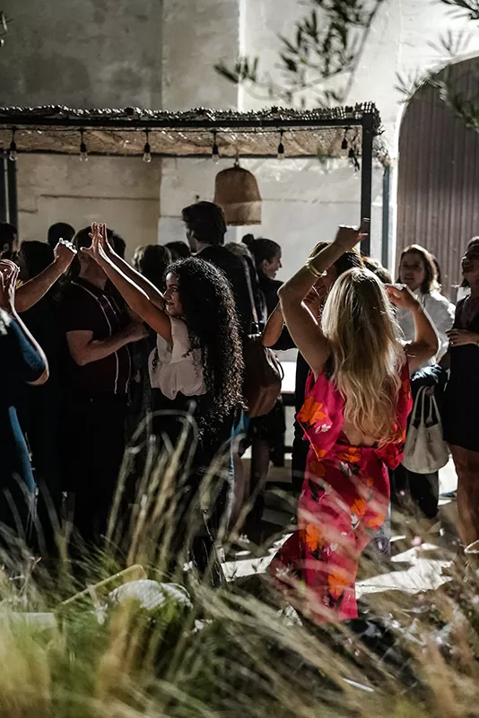 The Junot team dancing during a Junot seminar