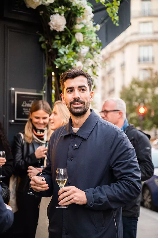 A Junot consultant during a Junot evening in a luxury Junot real estate agency