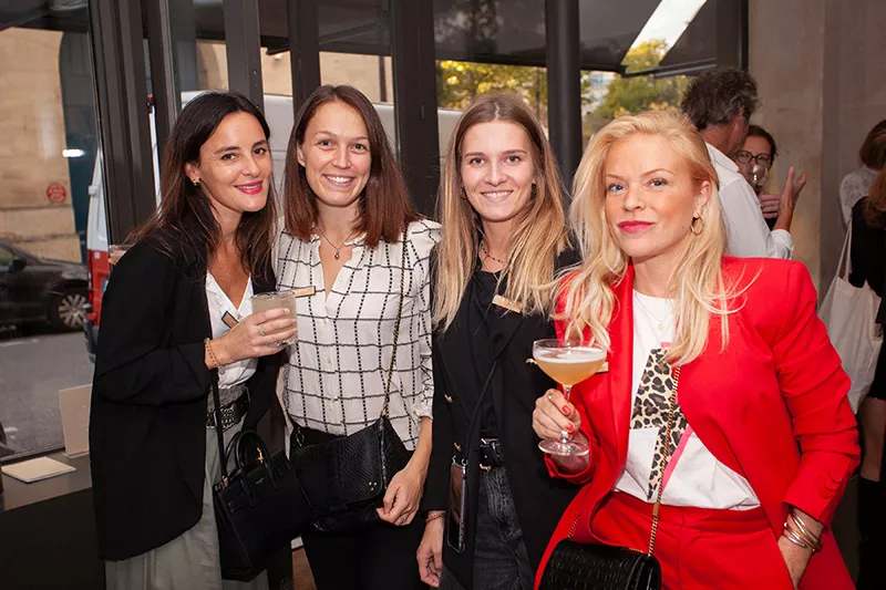 Four Junot consultants smiling at the camera